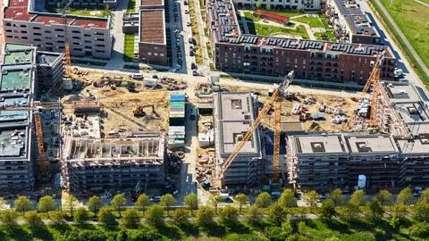 Large Construction Site in Germany with Multiple Cranes and Excavators Fotos Stock