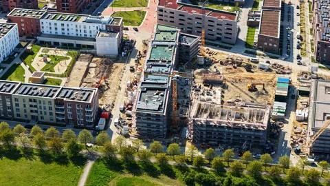 Large Construction Site in Germany with Multiple Cranes and Excavators Fotos Stock