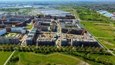 Large Construction Site in Germany with Multiple Cranes and Excavators Fotos Stock