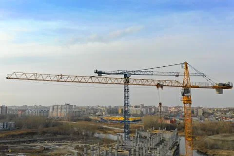 Large construction site including several cranes working on a building complex 写真素材