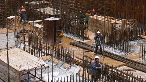 A large construction site. Metal structures, the basis for future concrete walls Stock Footage 258946507