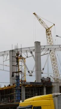 Large construction site in middle of the city. Vertical shot. Stock Photos