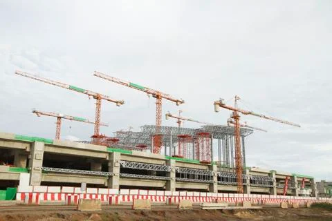Large construction site with tower crane and blue sky Stock Photos