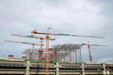 Large construction site with tower crane and blue sky Stock Photos