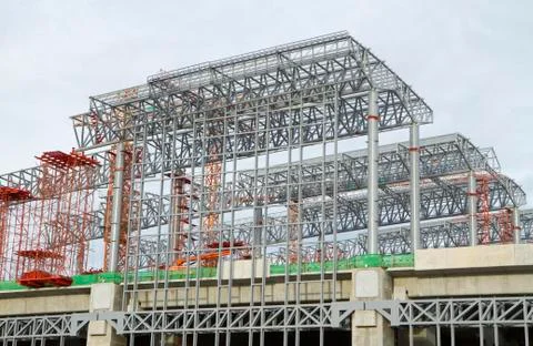 Large construction site with tower crane and blue sky Stock Photos