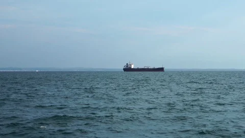 Large container cargo freight ship vessel oil tanker sailing slowly in calm Stock-Footage 95321345