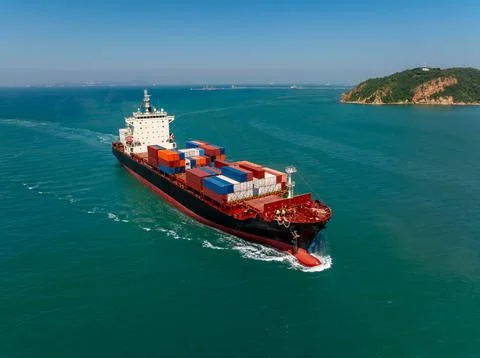 Large Container Cargo Ship Navigating Through Coastal Waters Wide Shot Photos