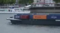 Large Container Cargo Ship Passing Fluvial Boat Rhine River CMA CGM Hapag Lloyd HD Footage
