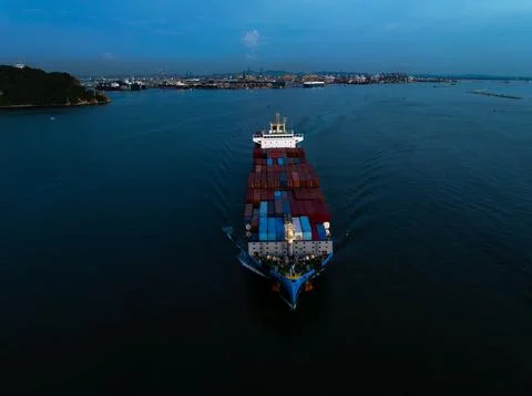 Large Container Cargo Ship Sailing In Deep Ocean Waters Near Si Racha Thail.. Stock Photos