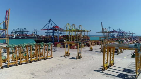 Large container cranes in freight port area Stock Footage 143717850