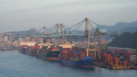 Large container cranes in the port load multi-colored containers Stock Footage 122023521