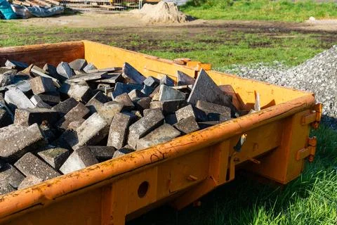 Large container filled with concrete blocks in a construction site Stock Photos