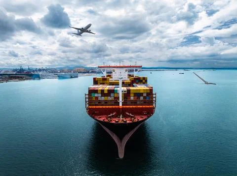 Large Container Ship Approaching Industrial Shipping Port In Chon Buri Thai.. Stock Photos