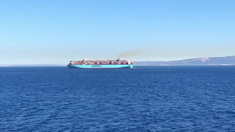 Large container ship arriving to the container terminal. Stock Footage 255113929