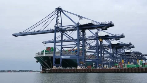 Large container ship being loaded with freight. Felixstowe Stock Footage 212320073