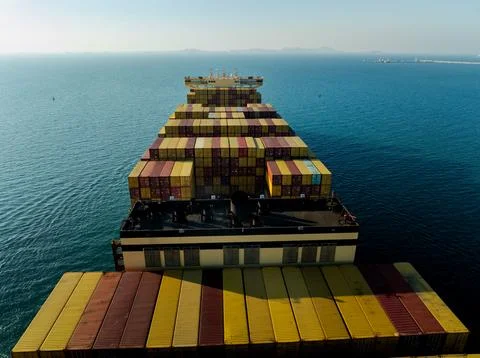 Large Container Ship Carrying Cargo Across The Ocean In Laem Chabang Chonbu.. Stock Photos