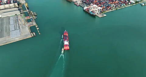 Large Container Ship Entering Industrial Port Harbor Assisted By Tugboat Wi.. Stock Footage 340131296