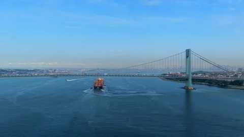 Large container ship entering the New York Harbor at the Verrazzano Bridge, 4K Stock Footage 345096915