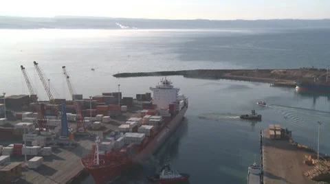 Large container ship leaving port time lapse Stock Footage 7778709