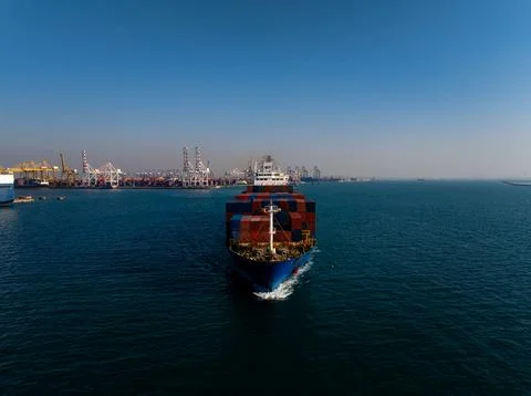 Large Container Ship Loaded With Cargo Navigating Open Sea Waters Elevated .. Photos