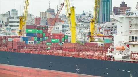 Large Container Ship with Montevideo City Background Stock Footage 61012508
