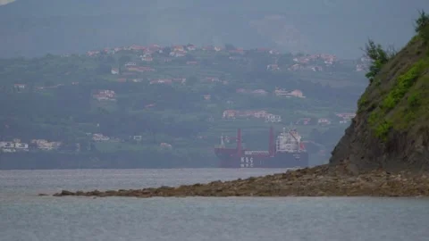 Large Container ship MSC Belle anchored off the coast of Italy Stock Footage 241149092
