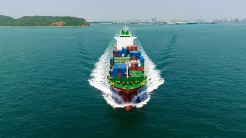 Large Container Ship Navigating Calm Blue Waters Near Port Terminal Thailan.. 写真素材