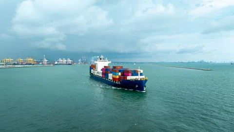 Large Container Ship Navigating Coastal Waters Near Laem Chabang Thailand W.. Stock Photos