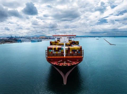 Large Container Ship Navigating Into Industrial Harbor Waters Wide Shot Fotos Stock