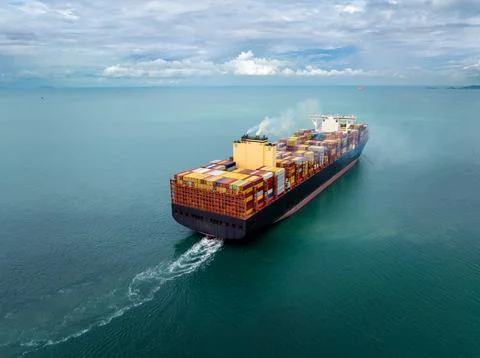 Large Container Ship Navigating Open Sea In Chonburi Province Thailand Wide.. Stock Photos