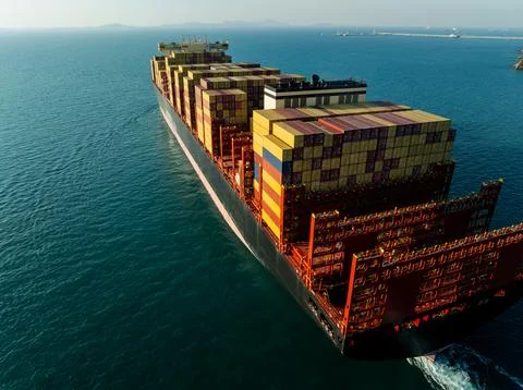 Large Container Ship Navigating Open Ocean Carrying Cargo Near Si Racha Cho.. Stock Photos