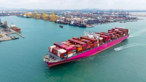 Large Container Ship Navigating Through A Busy Industrial Port Harbor High .. Fotos Stock