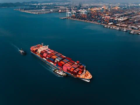 Large Container Ship Navigating Toward Industrial Harbor For Cargo Loading .. Fotos Stock