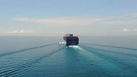 A large container ship for transporting goods near the port of Singapore. Stock Footage 134070113