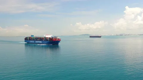 A large container ship for transporting goods near the port of Singapore. Stock Footage 134070136