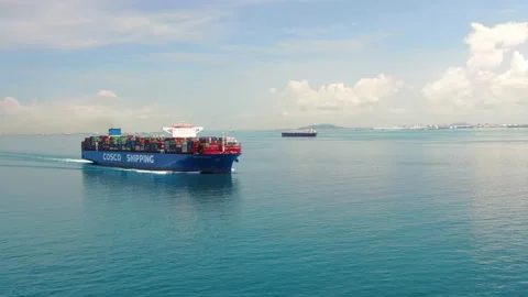 A large container ship for transporting goods near the port of Singapore. Stock Footage 134175150