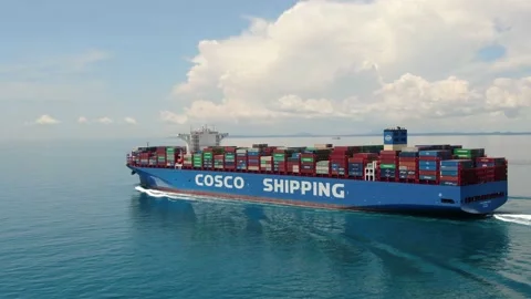 A large container ship for transporting goods near the port of Singapore. Stock Footage 134175724