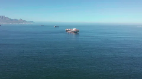 A large container ship for transporting goods near the port of Capetown, South 動画素材 155677904