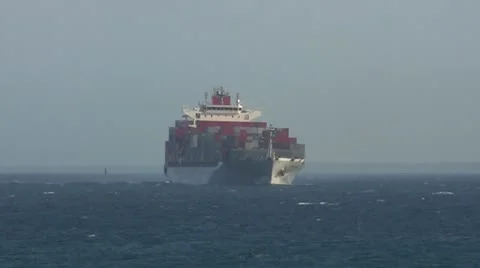 Large container ship turning to starboard. Stock Footage 12317975