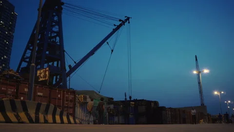 Large container terminal with metal cranes at walkway Stock Footage 156733838
