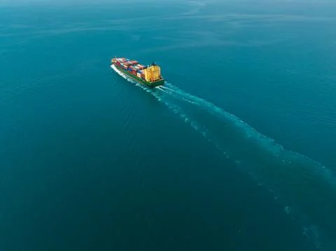 Large Container Vessel Navigating Deep Ocean Waters In The Gulf Of Thailand.. Photos