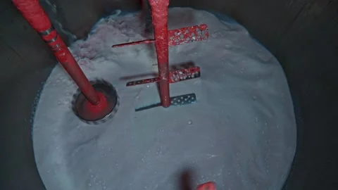 Large containers with stirred solution at the factory Stock Footage 239859941