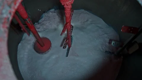 Large containers with stirred solution at the factory Stock Footage 239859947