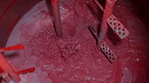 Large containers with stirred solution at the factory Stock Footage 239860129