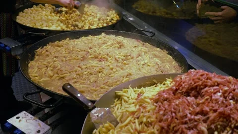 A large cooking pan with cabbage and noodles Stock Footage 266436500