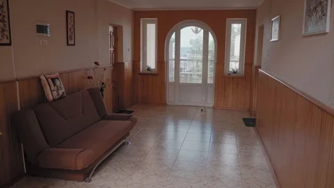 Large corridor with a window and a balcony by the sea Stock Footage 129520640