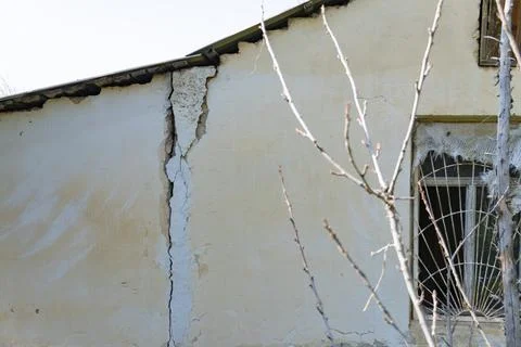 Large Crack in Old Wall of Building, Structural Damage Concept Stock Photos