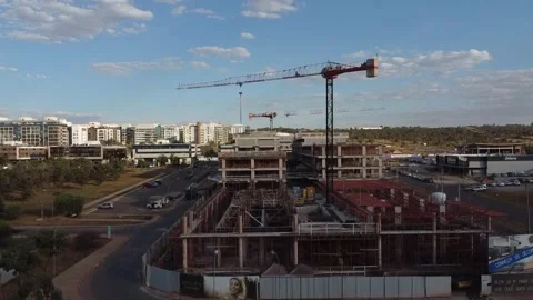 A Large crane being used for the construction of a new apartment building Stock Footage 245767429