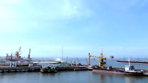 Large crane is clearly visible at the Gresik Stock Footage 197494689