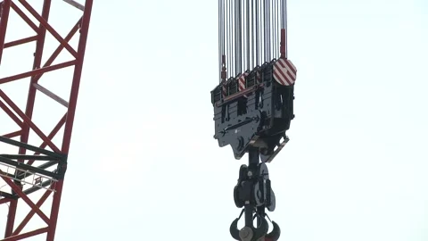 Large crane hook against the sky. Stock Footage 102362880